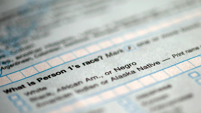 PHOTO: The first page of the 2010 Census form shows Question 9: "What is Person 1s race" with options for White: Black, African Am., or Negro.