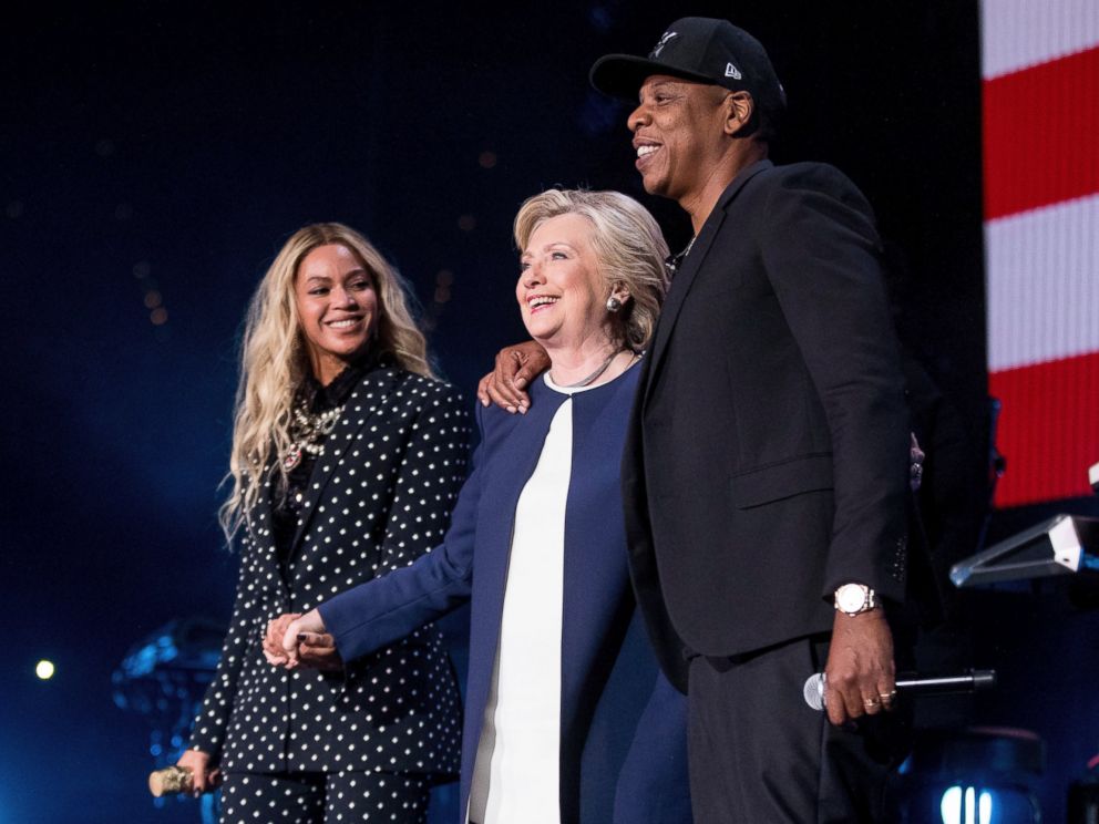 PHOTO: Democratic presidential candidate Hillary Clinton, center, appears on stage with artists Jay Z, right, and Beyonce, left, during a free concert at at the Wolstein Center in Cleveland, Friday, Nov. 4, 2016.