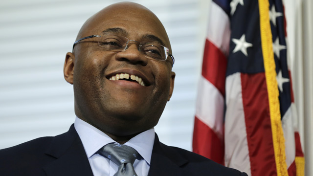 PHOTO: William "Mo" Cowan smiles during a news conference where he was named interim U.S. Senator for the seat vacated by U.S. Sen. John Kerry, D-Mass., at the Statehouse in Boston on Jan. 30, 2013.
