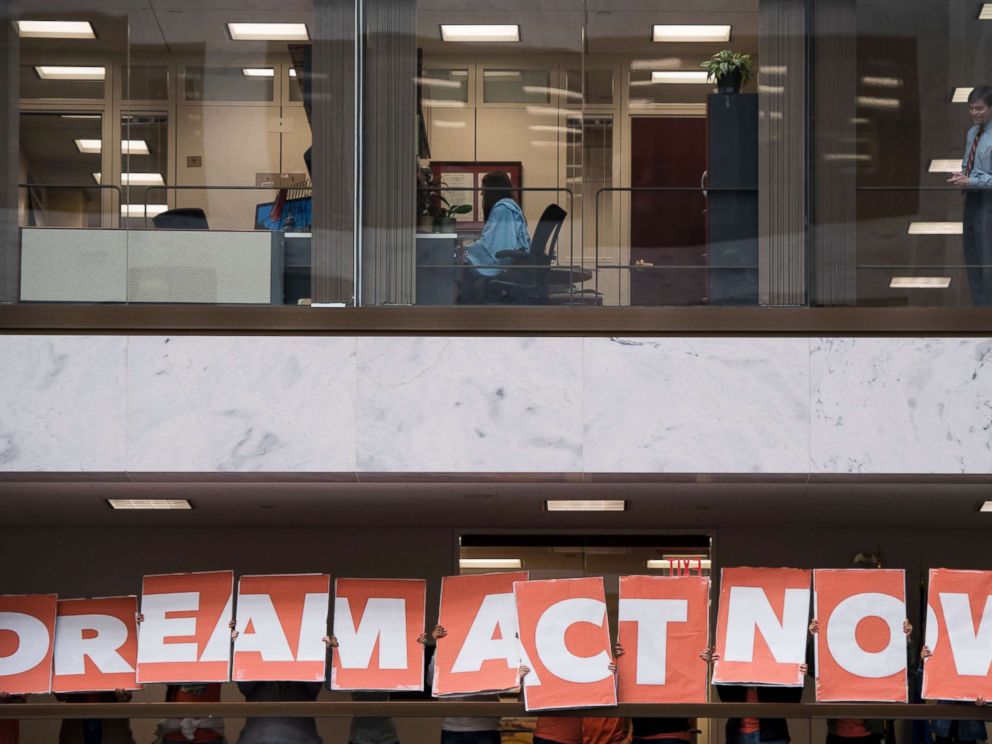 PHOTO: Demonstrators with United We Dream and others rally in the atrium of Hart Senate Office Building on January 16, 2018, to call on congress to pass the Dream Act, that protects young immigrants from deportation.