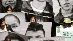PHOTO: Supporters of the New York DREAM Act hold photos of undocumented students who are not eligible for college tuition assistance during a rally at the Capitol on Tuesday, May 21, 2013, in Albany, N.Y. The state Assembly today is expected to pass DREAM
