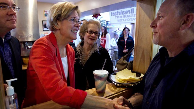 PHOTO: Democratic candidate for U.S. Senate Elizabeth Warren, center, greets Bruce Trotto, of Shrewsbury, Mass., right, during a campaign stop at the diner in Shrewsbury, April 29, 2012.