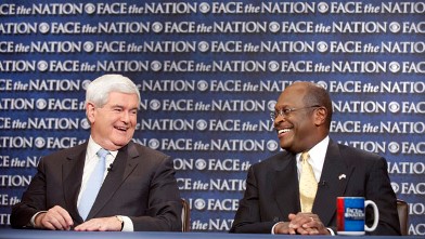 PHOTO: Republican presidential candidates, businessman Herman Cain, right, and former House Speaker Newt Gingrich talk during their appearance on CBS's "Face the Nation" in Washington, Oct. 8, 2011.
