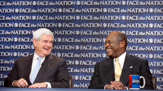 PHOTO: Republican presidential candidates, businessman Herman Cain, right, and former House Speaker Newt Gingrich talk during their appearance on CBS's "Face the Nation" in Washington, Oct. 8, 2011.