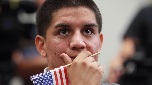 PHOTO: Jose Machado, a student of Nicaraguan descent, reacts during an announcement on the new U.S. immigration law during a news conference at the downtown Wolfson Campus of Miami-Dade College on Friday, June 15, 2012, in Miami.