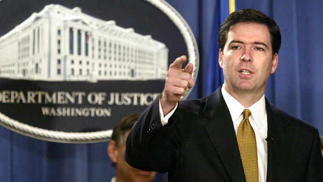 PHOTO: Deputy Attorney General James Comey gestures during a news conference in Washington, Jan. 14, 2004.