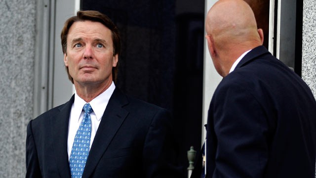PHOTO: John Edwards, left, leaves a federal courthouse in Greensboro, N.C.