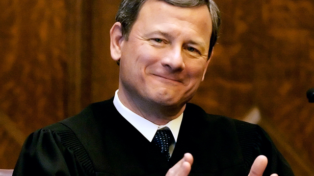 PHOTO: U.S. Supreme Court Chief Justice John G. Roberts, Jr., applauds at the opening celebration of the Centennial of the U.S. Courthouse in Providence, R.I., Feb. 12, 2008.