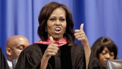 PHOTO: First lady Michelle Obama gives a thumbs up in response to students' cheers after she handed out diplomas to graduates of Martin Luther King, Jr. Academic Magnet High School on Saturday, May 18, 2013, in Nashville, Tenn.