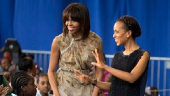 PHOTO: First lady Michelle Obama and actress Kerry Washington smile as they arrive for a performance at Savoy Elementary School in Washington, May 24, 2013.