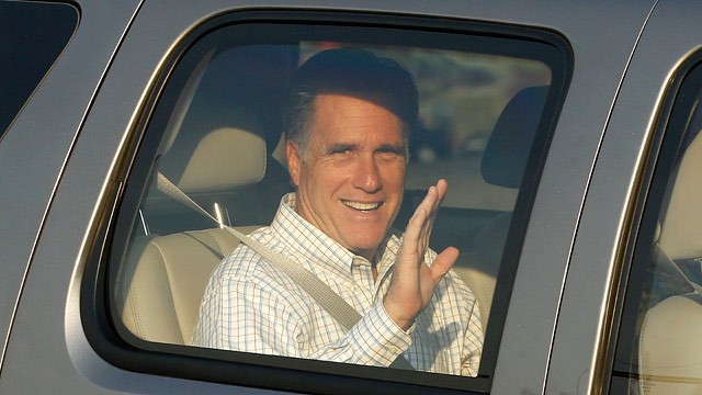 PHOTO: Republican Presidential candidate Mitt Romney waves as he arrives at the Utah Olympic Park for a private dinner during a donors conference in Park City, Utah, Friday, June 22, 2012.