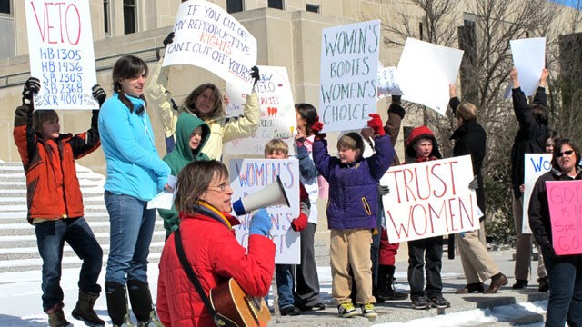 PHOTO: Kris Kitko leads chants of protest at an abortion-rights rally at the state Capitol in Bismarck, N.D., March 25, 2013.