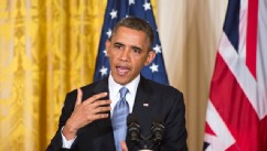 PHOTO: During a joint news conference with visiting British Prime Minister David Cameron, President Barack Obama defends his administration's actions in the wake of the attacks on the U.S. consulate in Benghazi, Libya, calling criticism a political sidesh