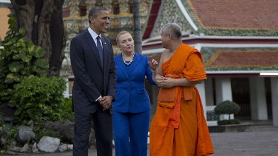 PHOTO: U.S. President Barack Obama, left, and U.S. Secretary of State Hillary Rodham Clinton, center, tour the Wat Pho Royal Monastery with Chaokun Suthee Thammanuwat, Dean, Faculty of Buddhism Assistant to the Abbot of Wat Phra Chetuphon, in Bangkok, Tha