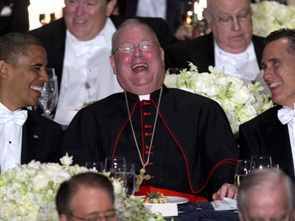 PHOTO: President Barack Obama, left, and Republican presidential candidate, former Massachusetts Gov. Mitt Romney, right, laugh with Cardinal Timothy Dolan during the Archdiocese of New Yorks 67th Annual Alfred. E. Smith Memorial Foundation Dinner.