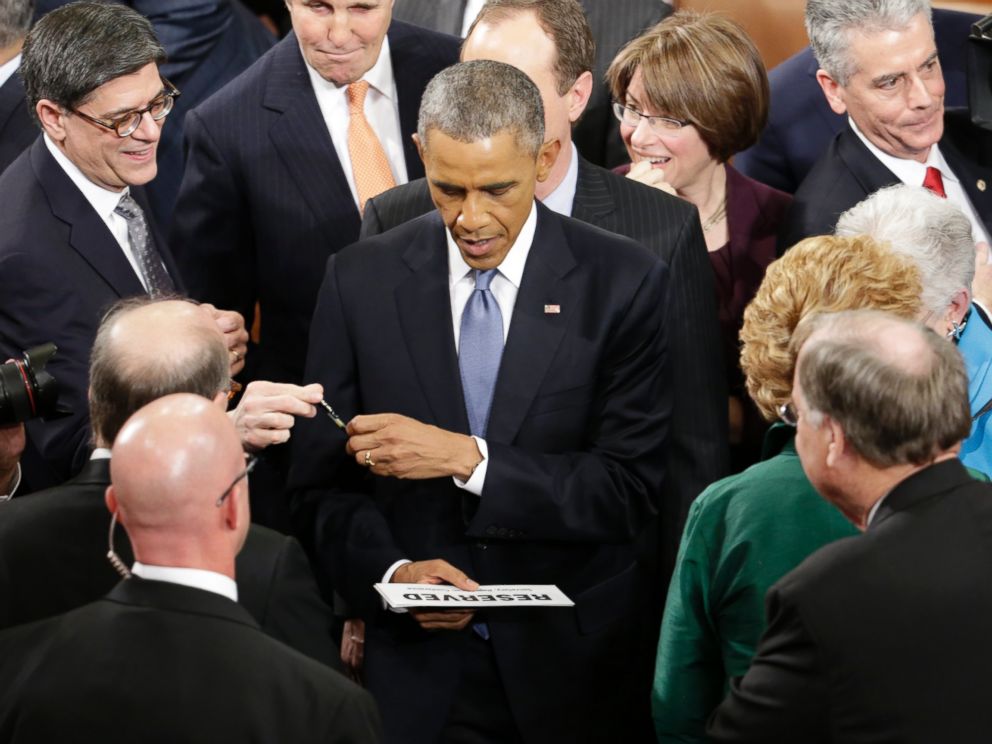 PHOTO: President Barack Obama prepares to sign an autograph on Capitol Hill in Washington, Jan. 20, 2015, after giving his State of the Union address before a joint session of Congress.