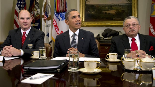PHOTO: Hennepin County Minnesota Sheriff Richard W. Stanek, left, and Charles H. Ramsey Police Commissioner of the Philadelphia Police Department, right, listen to President Barack Obama in the Roosevelt Room of the White House, Jan. 28, 2013, in Washingt