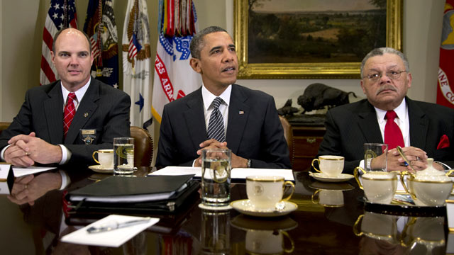 PHOTO: Hennepin County Minnesota Sheriff Richard W. Stanek, left, and Charles H. Ramsey Police Commissioner of the Philadelphia Police Department, right, listen to President Barack Obama in the Roosevelt Room of the White House, Jan. 28, 2013, in Washingt