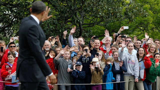 PHOTO: President Barack Obama waves to visitors as he walks on the South Lawn of the White House in Washington, March 30, 2012, as he travels to Vermont and Maine for campaign fundraising events.