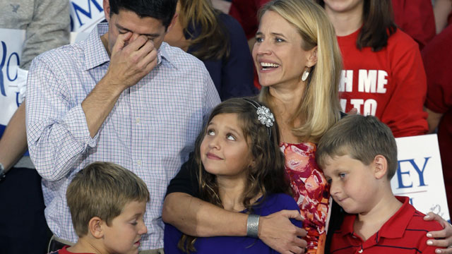 PHOTO: Republican vice presidential running mate Rep. Paul Ryan, R-Wis., left, fights back tears with his family, wife Janna, daughter Liza with sons Charles and Sam, at his side during a welcome home rally, Sunday, Aug. 12, 2012 in Waukesha, Wis.