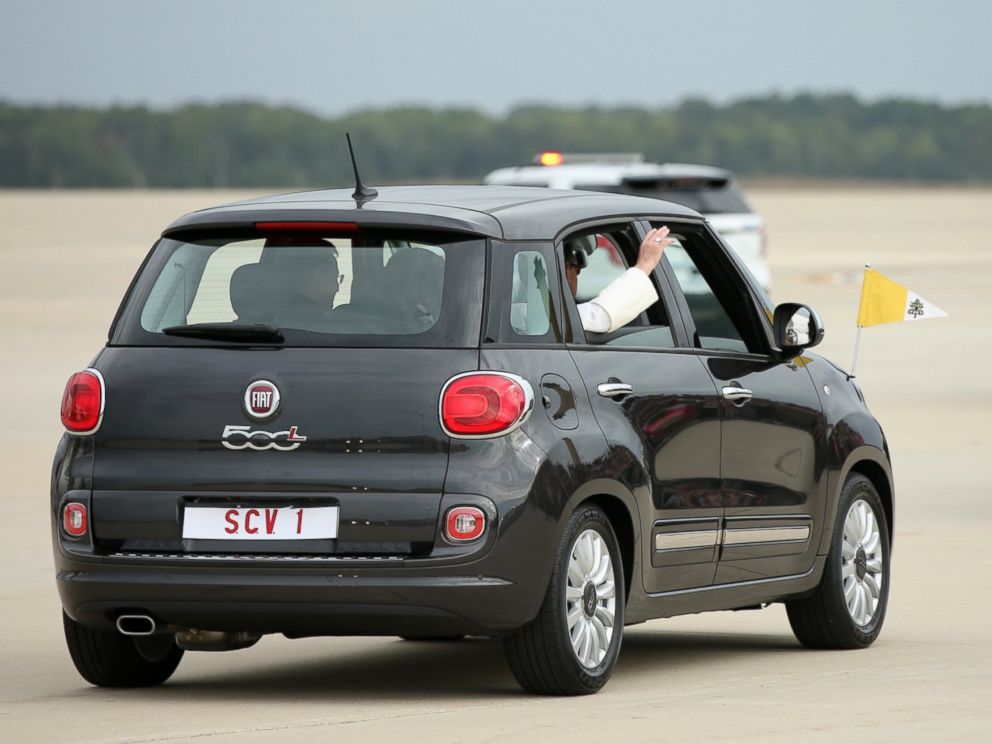 PHOTO: Pope Francis waves from a Fiat 500 as his motorcade departs from Andrews Air Force Base, Md., Sept. 22, 2015, where President and Mrs. Obama welcomed him.