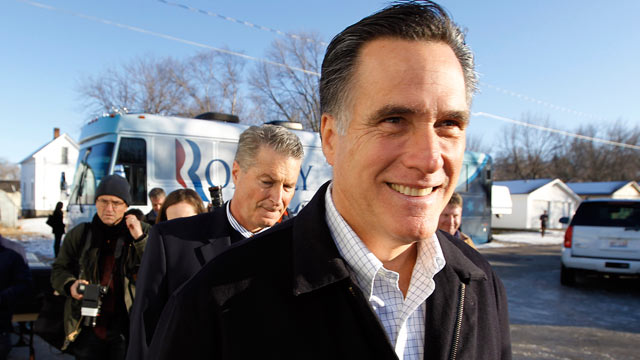 PHOTO: Republican presidential candidate and former Massachusetts Gov. Mitt Romney walks to a television interview following a campaign appearance at the Family Table restaurant, Jan. 1, 2012, in Atlantic, Iowa. Michael Douglas plays Gordon Gekko in Wall 