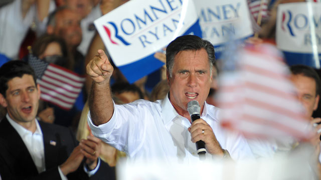 PHOTO: In this photo provided by the U.S. Coast Guard, Republican Presidential candidate Mitt Romney, right, speaks during a campaign rally in Manassas, Va., Saturday, Aug. 11, 2012.