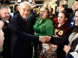 PHOTO: Republican presidential candidate Rep. Ron Paul, R-Texas, shakes hands with caucus goers as he visits a caucus site, Feb. 7, 2012, in Coon Rapids, Minn.