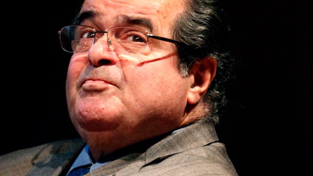 PHOTO: Supreme Court Justice Antonin Scalia looks into the balcony on Oct. 18, 2011 before addressing the Chicago-Kent College of Law in Chicago.