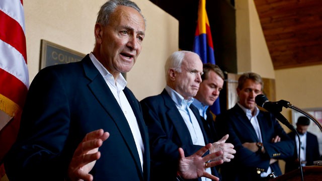 PHOTO: Sen. Chuck Schumer, D-N.Y., left, speaks to the media as, from second left, Sen. John McCain, R-Ariz., Sen. Michael Bennett, D-Colo., and Sen. Jeff Flake, R-Ariz., listen in during a news conference after their tour of the Mexico border with the Un