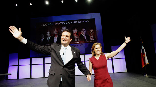 PHOTO: U.S. Senate Candidate Ted Cruz, left, and his wife Heidi Cruz wave as they take the stage during the Texas Republican Convention in Fort Worth, Texas, June 9, 2012.