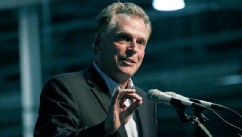 PHOTO: GreenTech Automotive chairman Terry McAuliffe speaks during the unveiling of GreenTech Automotive's new electric MyCar at their manufacturing facility in Horn Lake, Miss., July 6, 2012.
