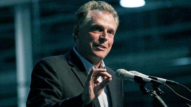 PHOTO: GreenTech Automotive chairman Terry McAuliffe speaks during the unveiling of GreenTech Automotives new electric MyCar at their manufacturing facility in Horn Lake, Miss., July 6, 2012.
