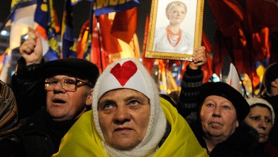 PHOTO: A protester holds up a photo of the imprisoned former Ukrainian Prime Minister, Yulia Tymoshenko, in Kiev, Ukraine, Nov. 12, 2012.