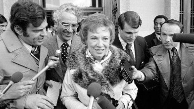 PHOTO: Rose Mary Woods, President Richard Nixon's personal secretary, and her attorney, Charles S. Rhyne are surrounded by newsmen, Feb. 2, 1974, as they leave U.S. District Court in Washington.