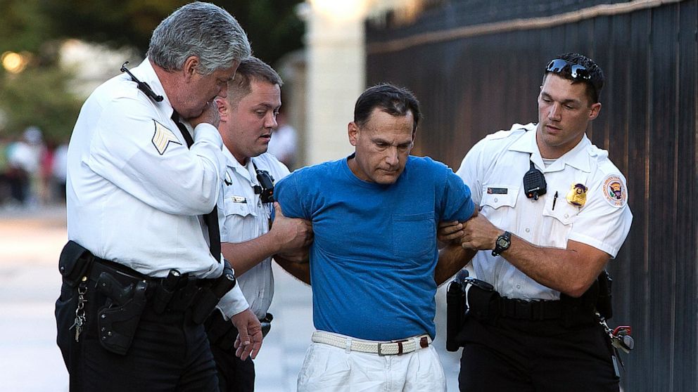 PHOTO: Man taken into custody by Secret Service police