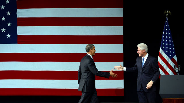 PHOTO: US President Barack Obama is introduced by former US President Bill Clinton during a fundraiser at the New Amsterdam Theater in New York, June 4, 2012.