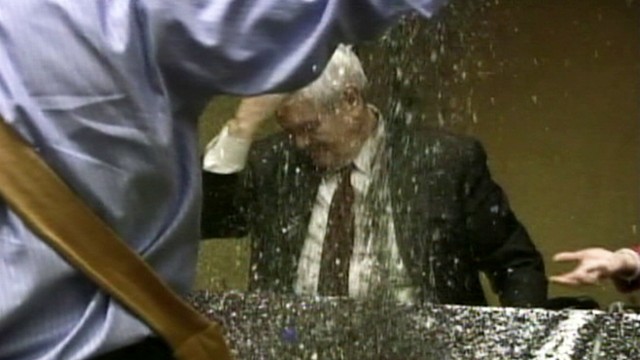 VIDEO: Gay rights activist pours glitter on Newt Gingrich at a book signing.