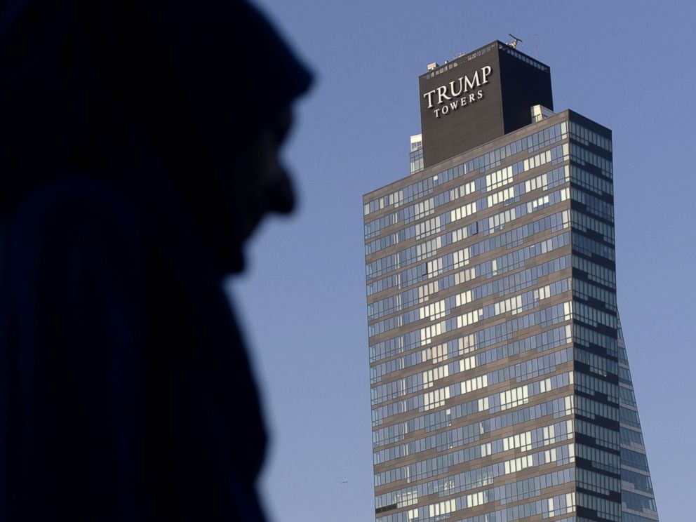 PHOTO: A woman walks past the Trump Towers building in Istanbul on July 30, 2015.