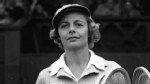 PHOTO: Alice Marble of the USA walks onto the Wimbledon court to play the Women's Singles Final, July 8, 1939.