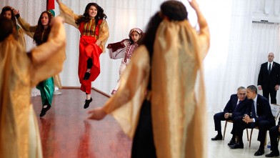 PHOTO: President Barack Obama, far right, and Palestinian Prime Minister Salam Fayyad, center, watch a performance of a local youth dance group during their visit to the Al-Bireh Youth Center in the West Bank city of Ramallah, March 21, 2013.
