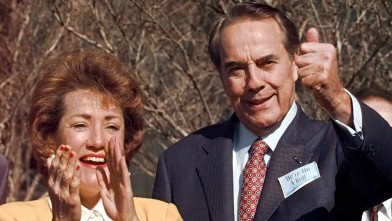 PHOTO: Republican presidential candidate Bob Dole, and his wife Elizabeth, react to the results of the New York primary to a crowd of supporters in Tampa, Florida in this March 8, 1996 file photo.