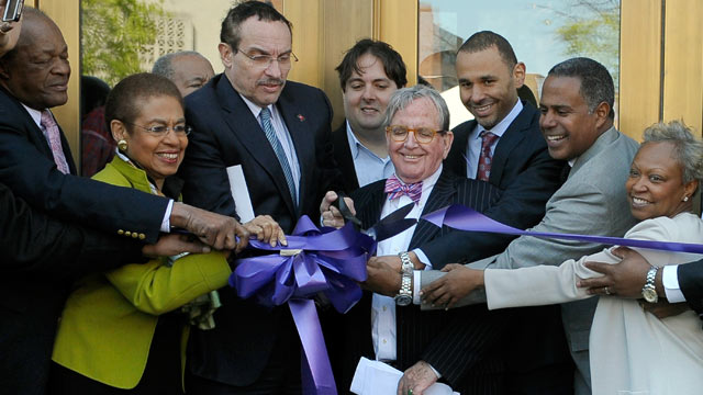 PHOTO: Council member Marion Barry, Congresswoman Eleanor Holmes-Norton, mayor Vincent Gray, council member Jim Graham, Malik and Chip Ellis of Ellis Development, Myla Moss are seen cutting the ribbon during the official opening at the Howard Theatre on A