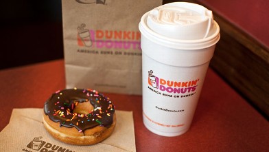 PHOTO: A chocolate glazed donut and a cup of coffee are seen at a Dunkin' Donuts Inc. store in West Orange, New Jersey on July 7, 2011.