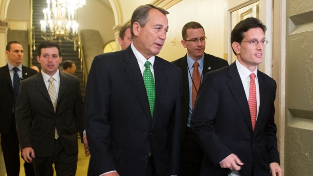 PHOTO: Speaker of the House John Boehner, R-Ohio, center, and House Majority Leader Eric Cantor, R-Va., right, arrive for the House Republican Conference meeting on the fiscal cliff legislation in the Capitol, Jan. 1, 2013.