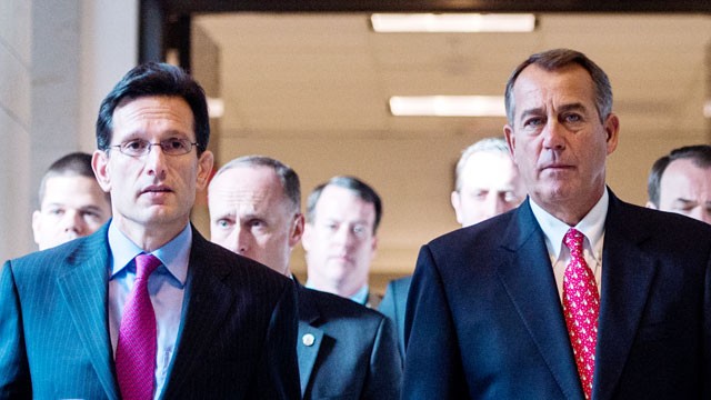 PHOTO: House Majority Leader Eric Cantor, R-Va., left, and Speaker of the House John Boehner, R-Ohio, make their way to their news conference, Dec. 21, 2012.