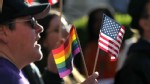 PHOTO: An opponent of Prop 8 holds an American flag and gay pride flag during a demonstration outside of the Ninth Circuit Court of Appeals in this Dec. 6, 2010 file photo in San Francisco, Cali.