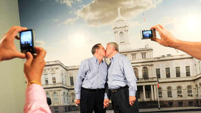 PHOTO: Ray Durand, left, and Dale Shields kiss while having their picture taken after their wedding ceremony at the Manhattan City Clerks office in New York, July 24, 2011.