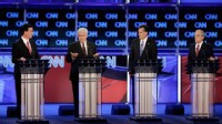 PHOTO: Republican presidential candidates Rick Santorum, Newt Gingrich, Mitt Romney and Ron Paul participate in a debate sponsored by CNN at the University of North Florida on Jan. 26, 2012.