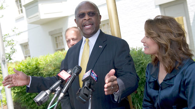 PHOTO: Rep. Michele Bachmann, R-Minn., appeared at the Capitol Hill Club with former GOP presidential contender Herman Cain, who announced his support for Mitch Romney to be President, May 16, 2012.